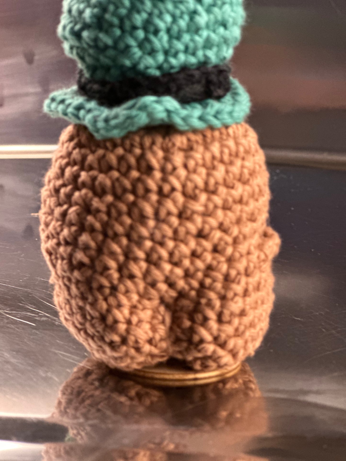 St Patricks Potato with Leprechaun hat and holding a shamrock