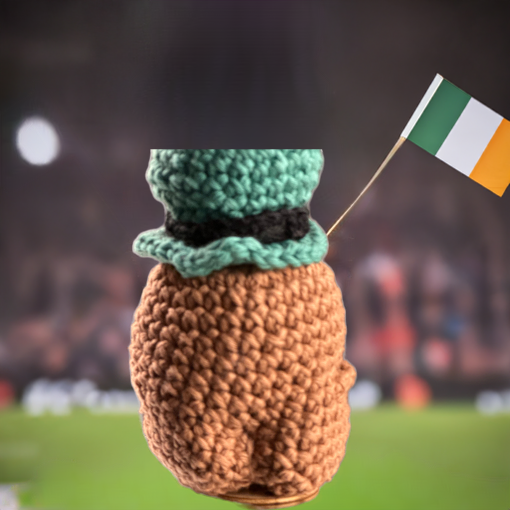 St Patricks Potato with Leprechaun hat and holding a shamrock